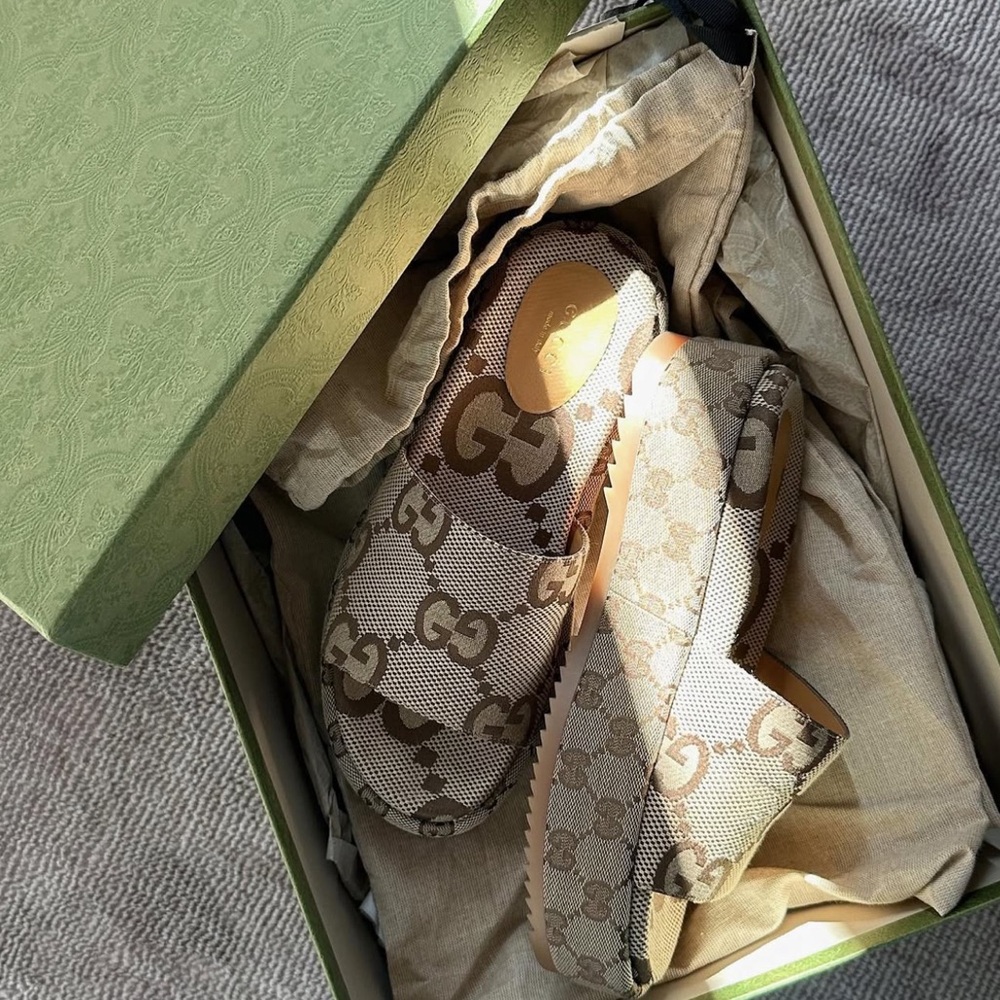 Gucci woman Tan Logo Slide Sandals good condition

Size 37 with box and receipt